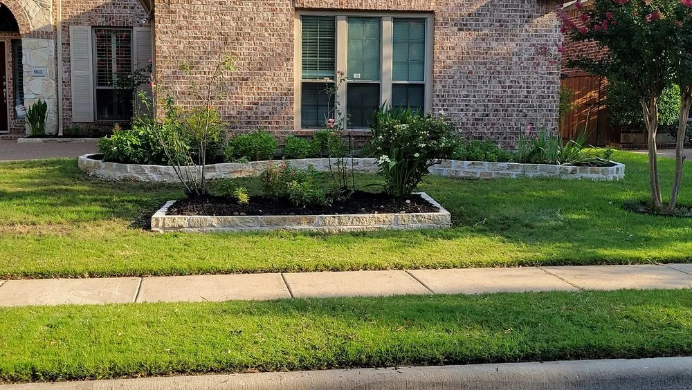 Expert outdoor landscaping for residential properties in Denison, TX by Top Notch Landscaping