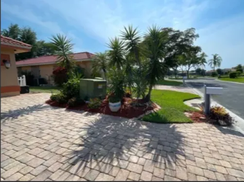 Affordable landscape installation for year-round maintenance in Fort Myers, FL by Top Notch Landscaping