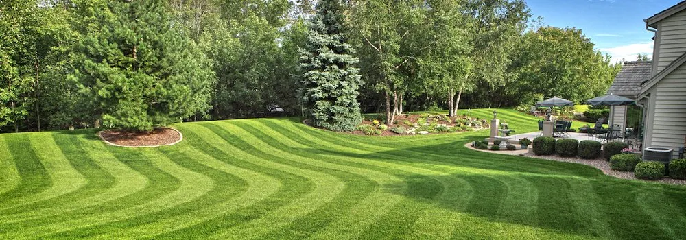 Local lawn mowing service with custom design in Delaware, OH by Top Notch Lawn Care