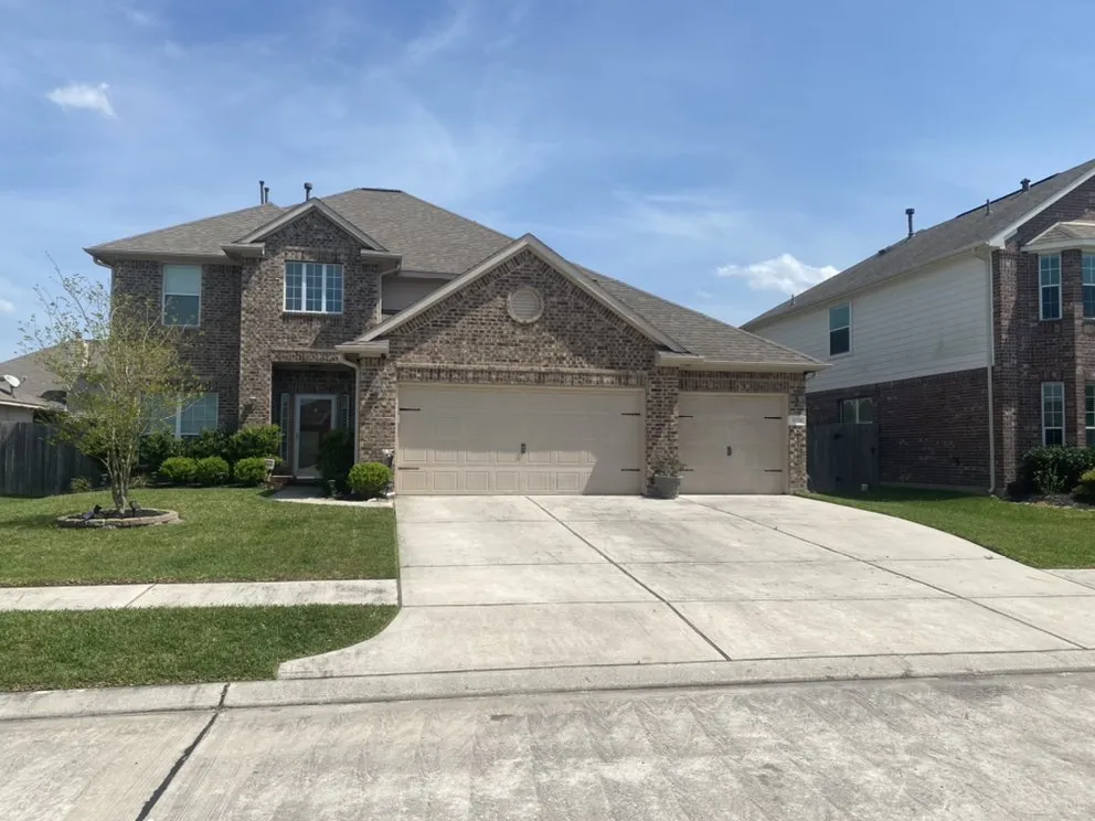 Local landscaping services for homes in Humble, TX by Top Notch Lawn Care