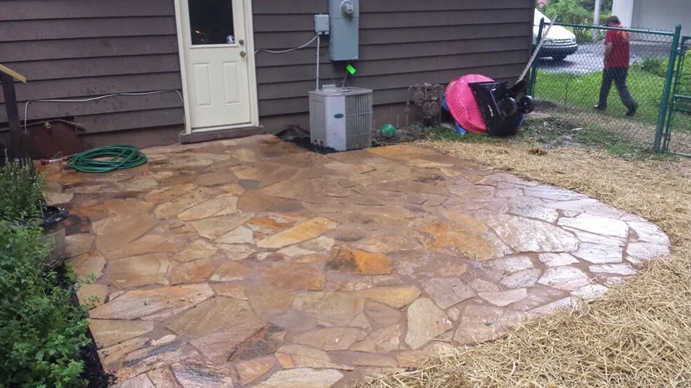 Custom yard cleanup service with custom design in Bloomington, IN by Top Notch Mowing and Landscapes