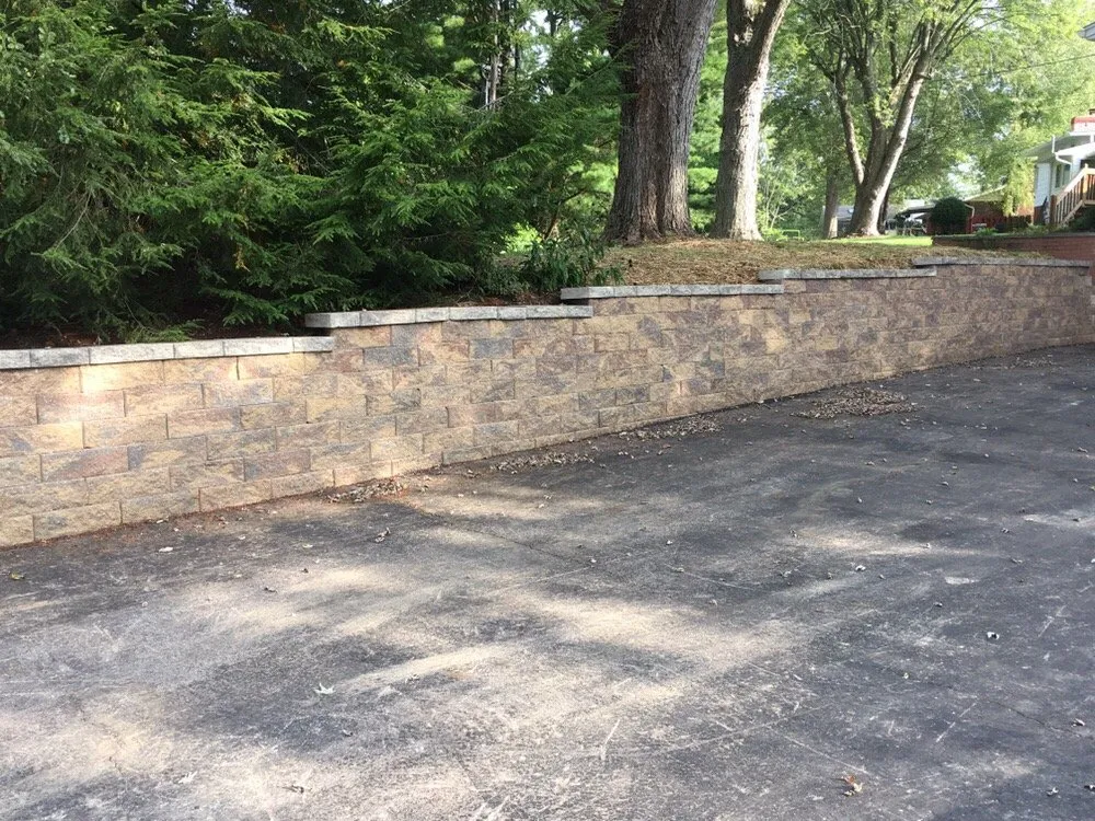 Affordable landscape design for residential properties in Bloomington, IN by Top Notch Mowing and Landscapes