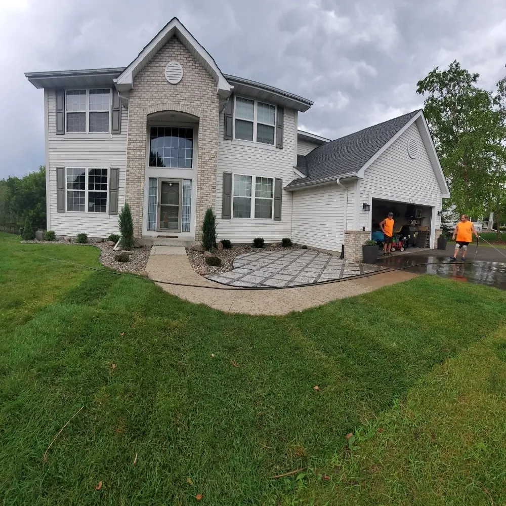 Custom lawn care service with custom design in Richfield, MN by Top Notch Property Management Services