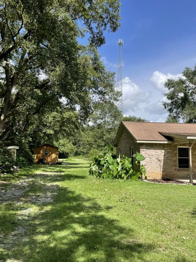 Custom yard maintenance for beautiful yards in Lucedale, MS by Top Notch Tractor & Tree