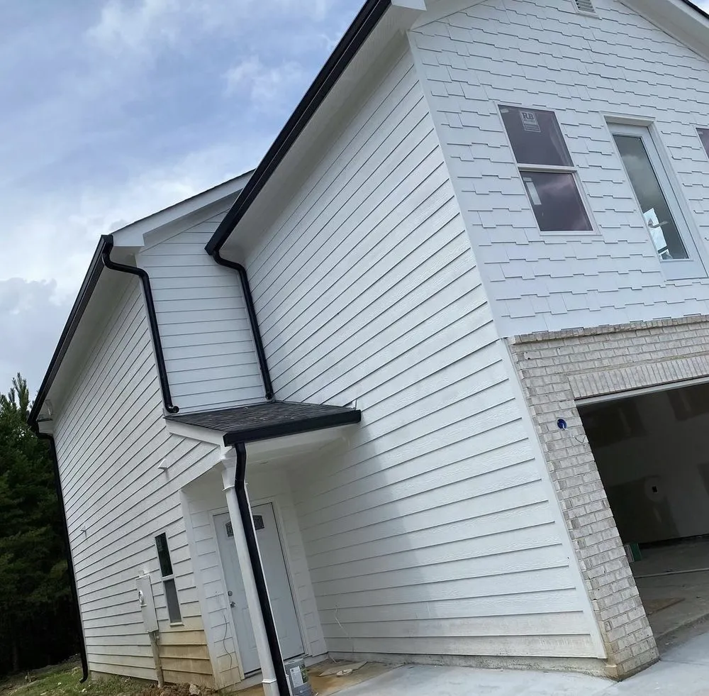 Custom lawn care service for residential properties in Atlanta, GA by Top of the Hill Services