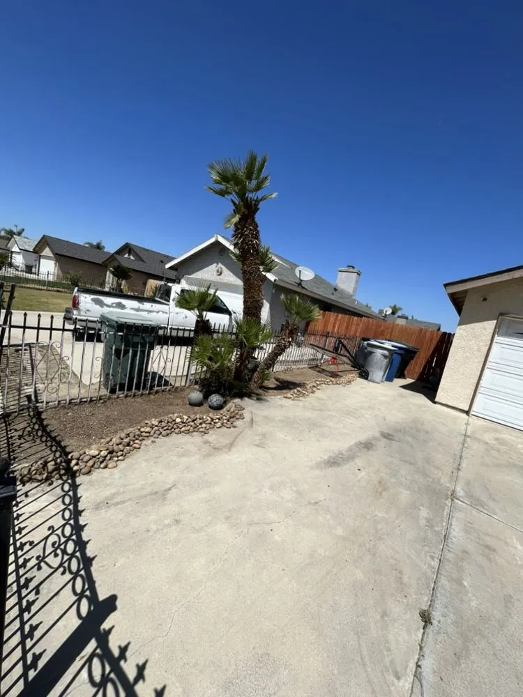 Professional lawn mowing service in Bakersfield, CA by Top Quality Landscaping