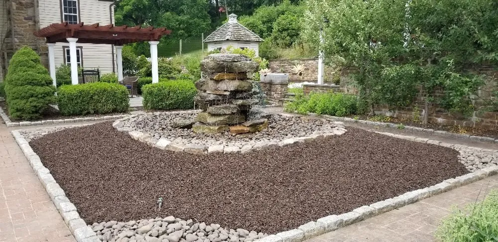 Expert lawn mowing service in Milton, PA by Top Rock Design/Landscape