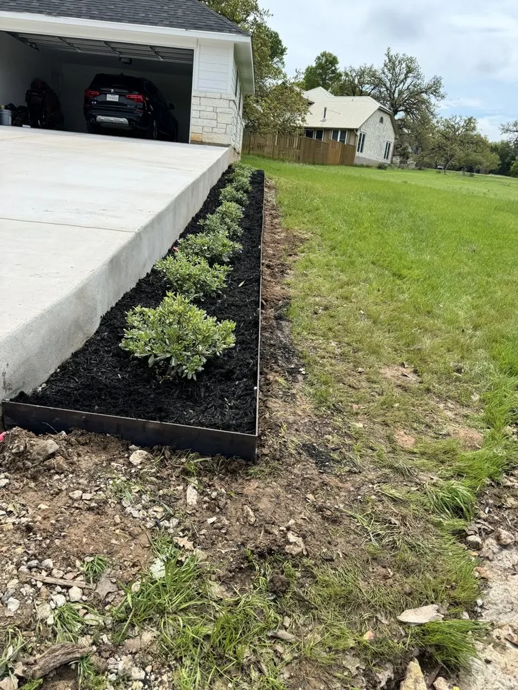 Custom lawn mowing service for homes across Kyle, TX - Top Score Landscaping