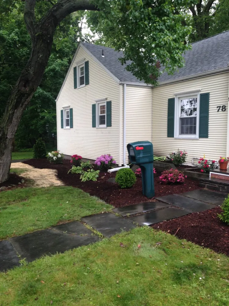 Professional lawn mowing service in Milford, CT by Top Seed Landscaping