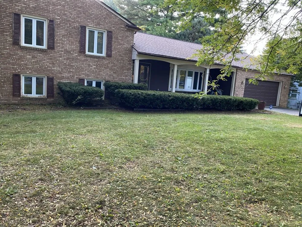 Affordable lawn mowing service for outdoor upgrades in Ypsilanti, MI by Top Shelf