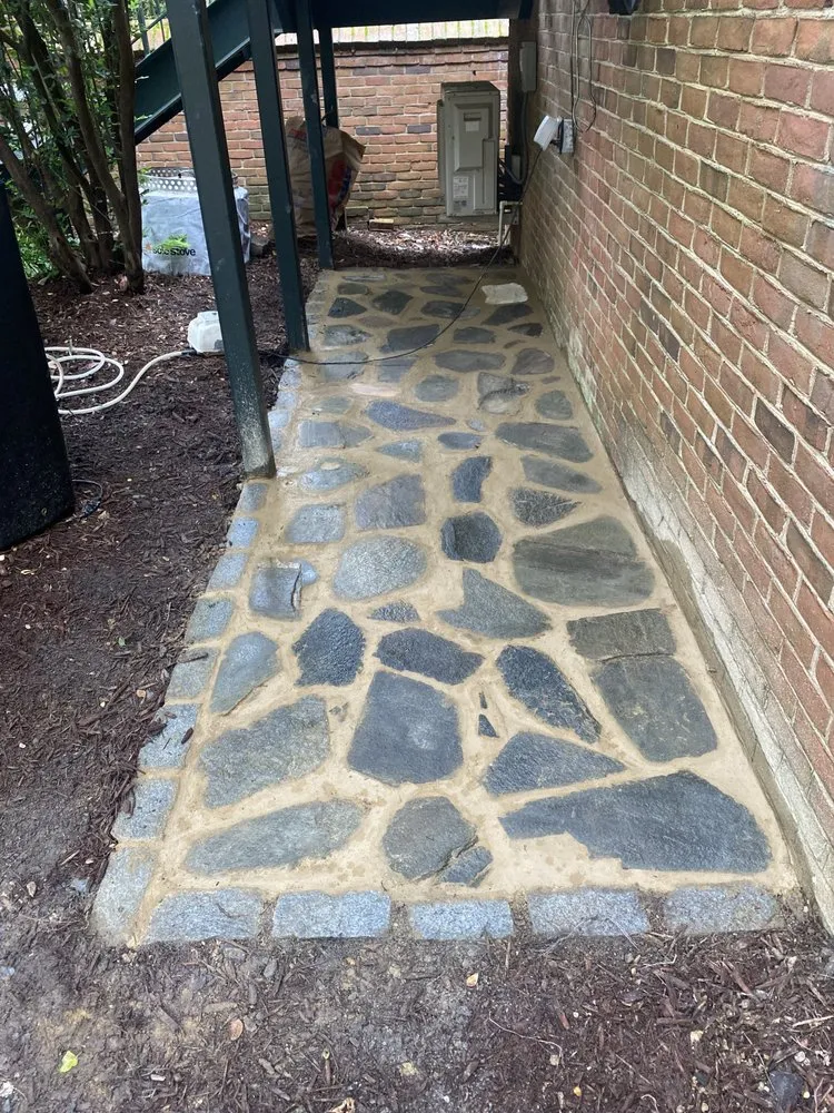 Professional lawn mowing service for year-round maintenance across Atlanta, GA - Top Standard Masonry and Services