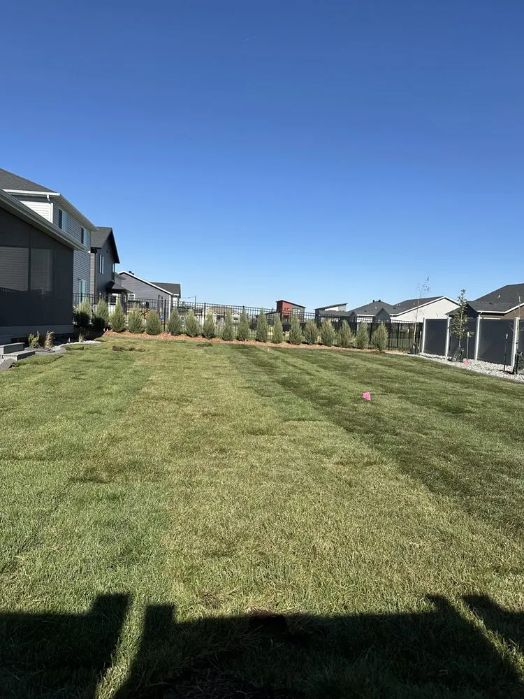 Professional landscape installation for outdoor upgrades in West Fargo, ND by Top Tier Landscaping