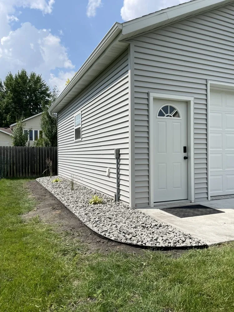 Professional landscape installation for year-round maintenance in West Fargo, ND by Top Tier Landscaping