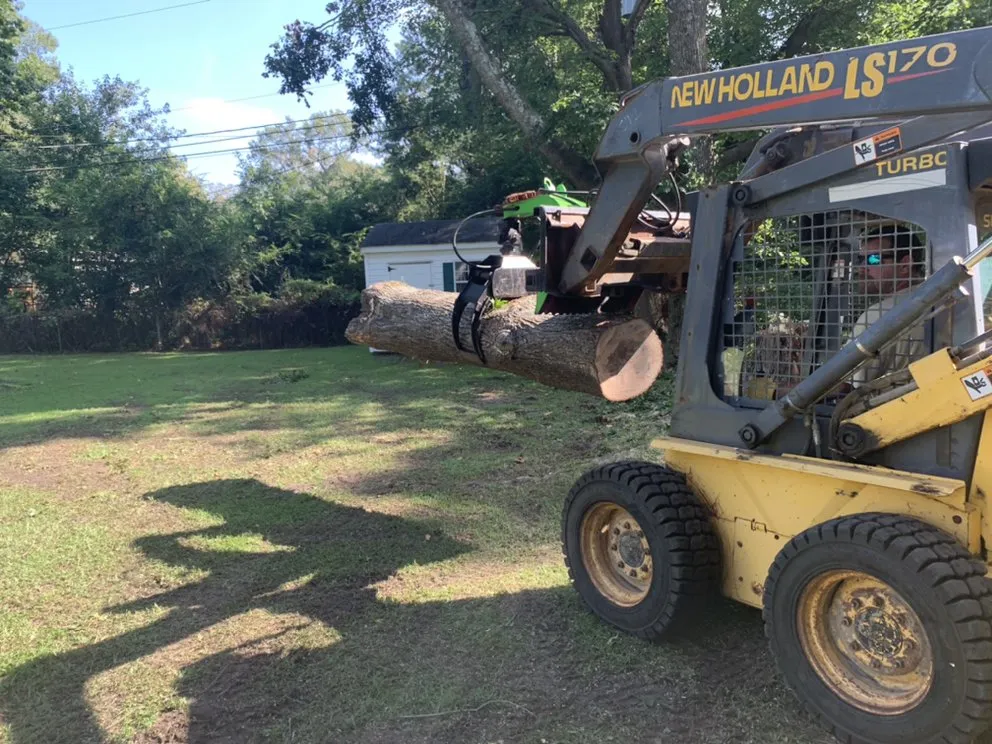 Affordable yard cleanup service for outdoor upgrades in Manteo, NC by Top To Bottom Tree Service and Landscaping