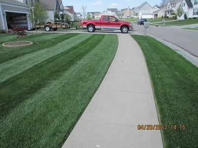 Affordable landscaping services for year-round maintenance in Uniontown, OH by Top Turf Lawn Care