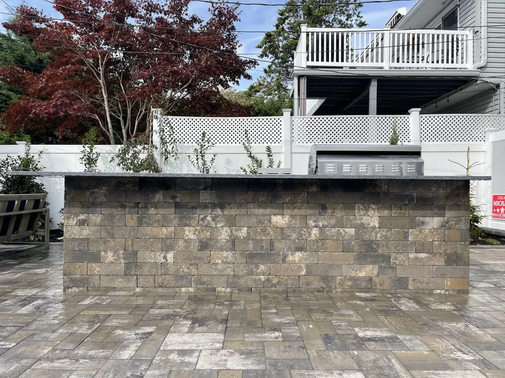 Affordable lawn mowing service in Oceanside, NY by Topaz Design Group