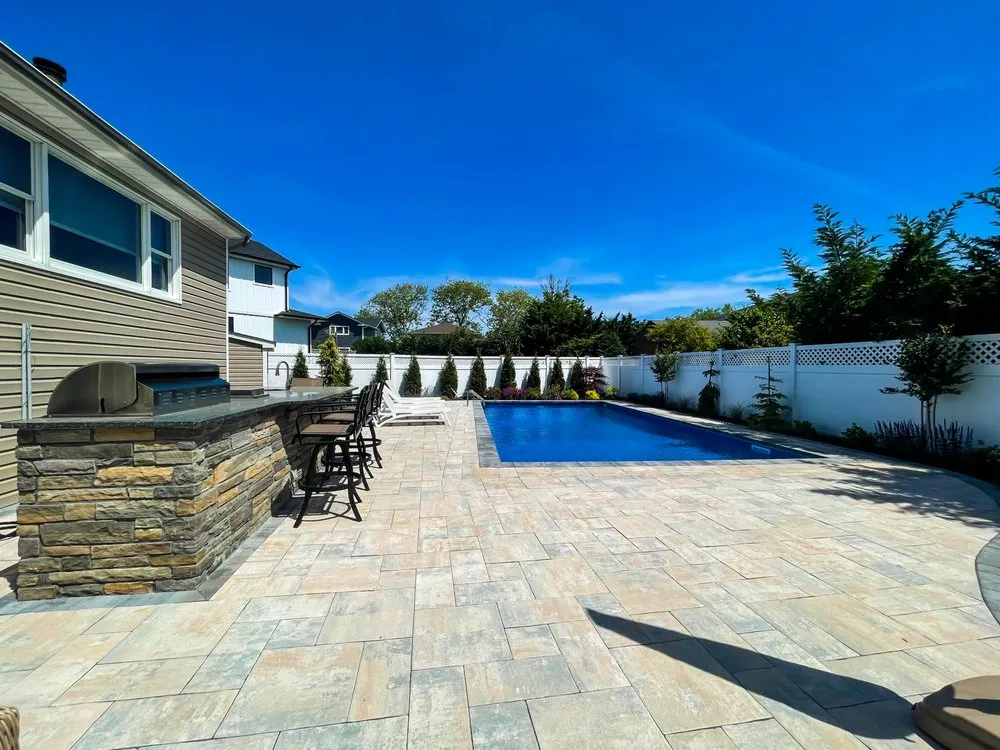Custom outdoor landscaping for homes in Oceanside, NY by Topaz Design Group