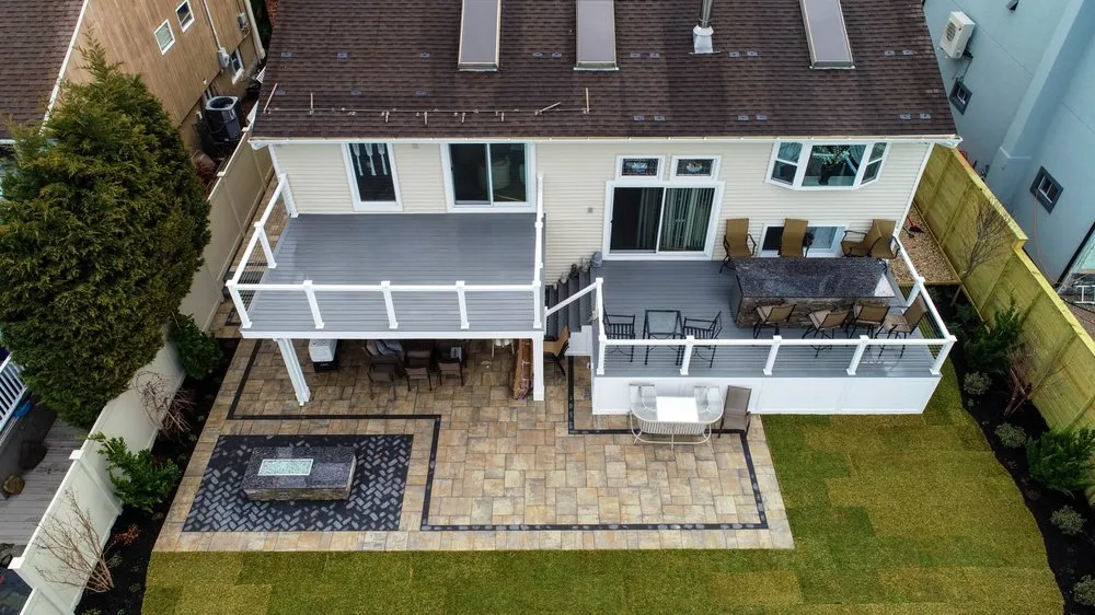 Trusted lawn mowing service for residential properties in Oceanside, NY by Topaz Design Group