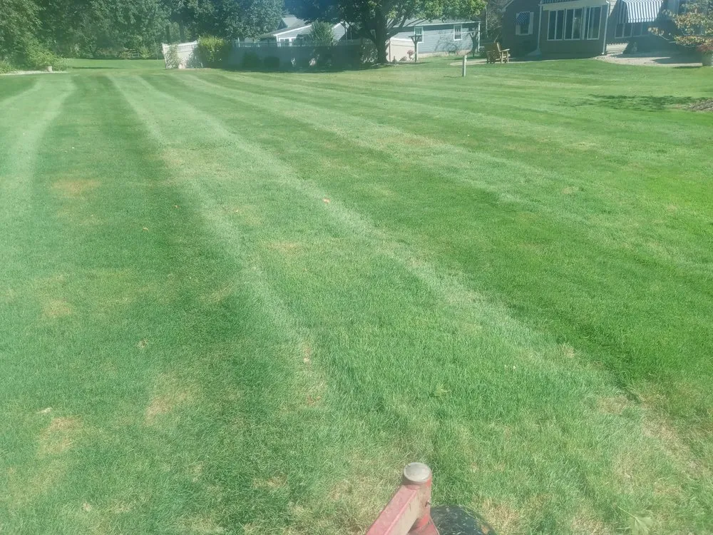 Affordable lawn mowing service for year-round maintenance across Holyoke, MA - Topdog All Landscaping Services