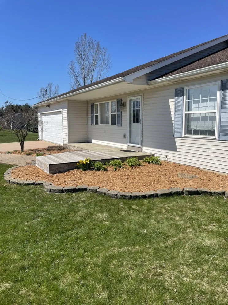 Local garden landscaping for residential properties in Fowlerville, MI by Topio Land Services