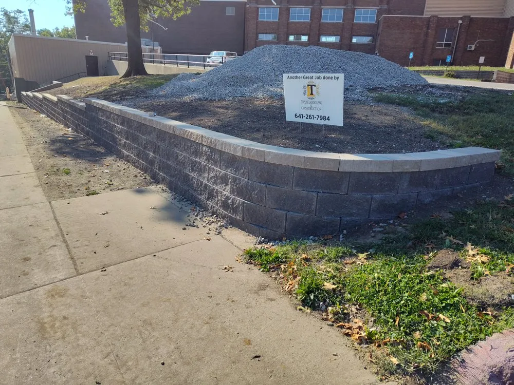 Professional yard cleanup service for beautiful yards in Ottumwa, IA by Topline Landscaping and Construction