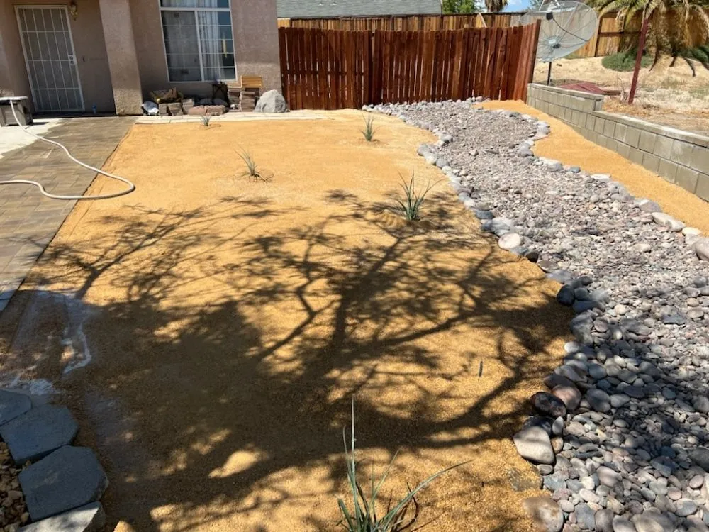 Custom lawn care service for year-round maintenance in Lake Los Angeles, CA by Topp Gunn Landstructions