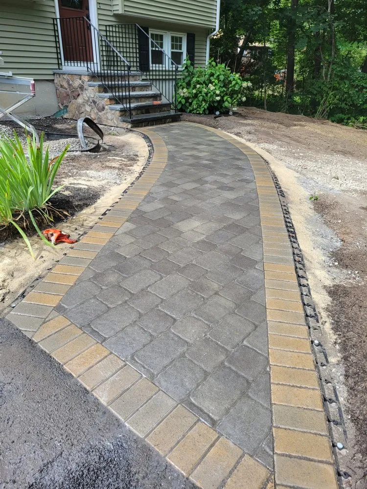 Affordable landscape installation with custom design in Billerica, MA by Topping Landscaping