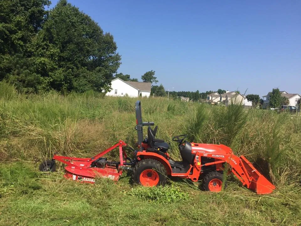 Affordable lawn mowing service with custom design in North Topsail Beach, NC by Topsail Moonlight Management
