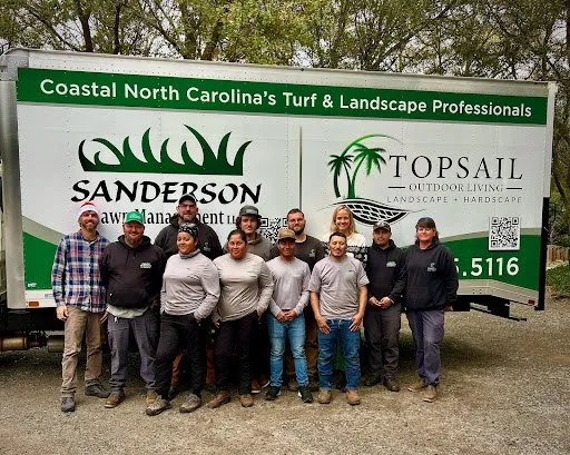 Professional lawn mowing service for homes in Hampstead, NC by Topsail Outdoor Living