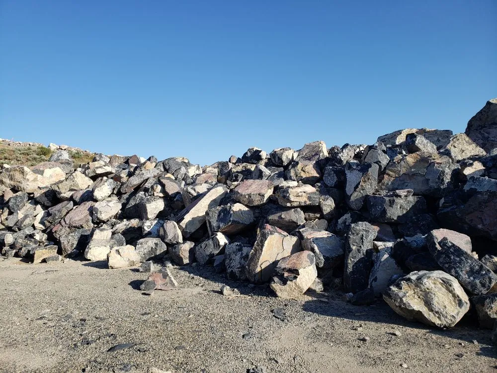 Custom landscape installation for year-round maintenance in Springville, UT by Topsoil Rocks