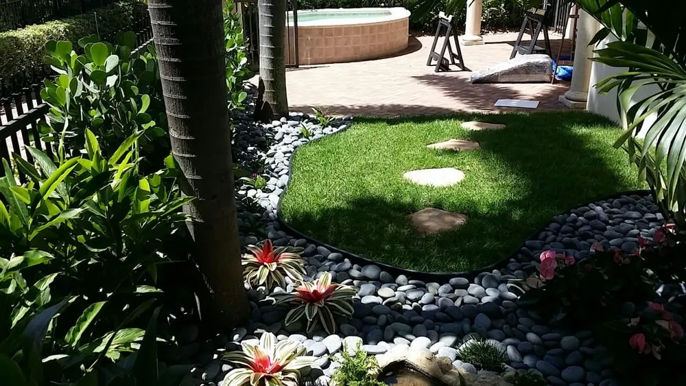 Trusted lawn mowing service with custom design in Delray Beach, FL by Total Care Property Maintenance Group