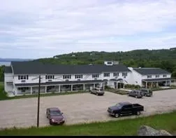 Local landscaping services for year-round maintenance across Laconia, NH - Total Concepts Steel Roofing