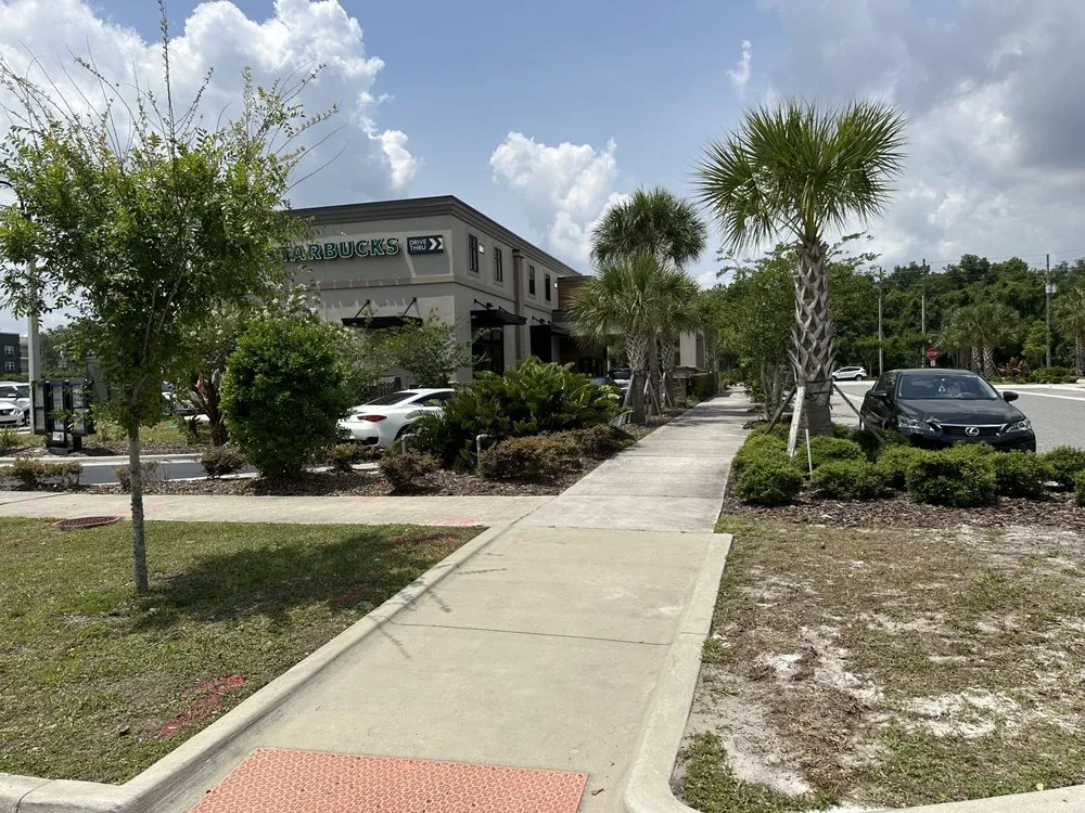 Affordable outdoor landscaping for year-round maintenance in Apopka, FL by Total Green Lawn