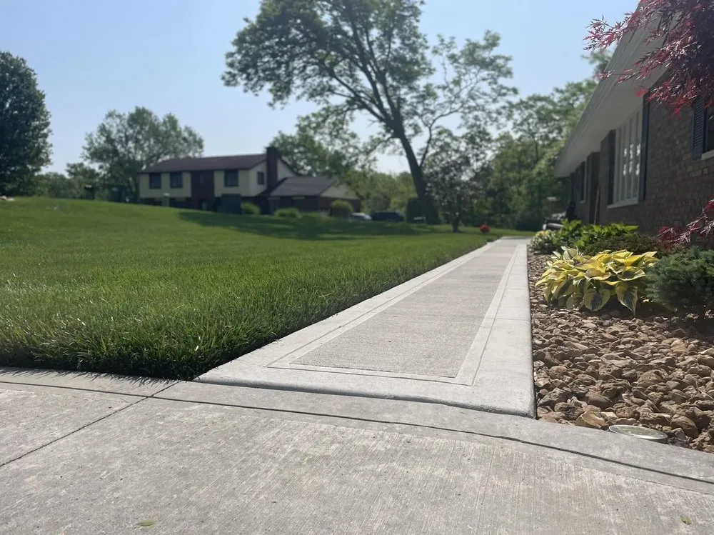 Custom landscape design for residential properties in Union, KY by Total Green