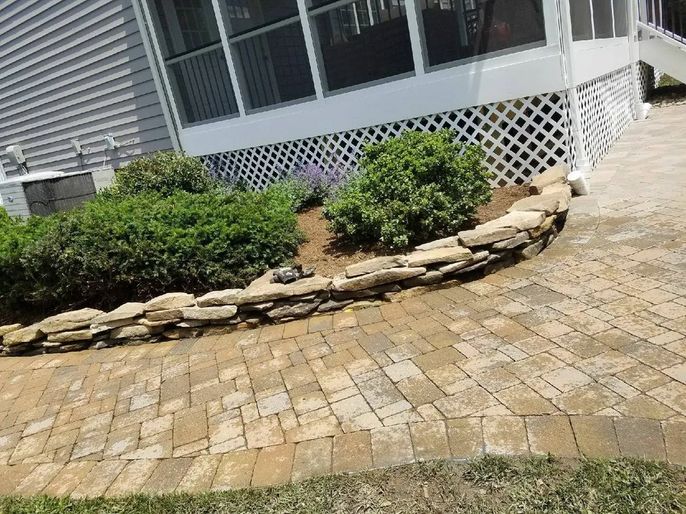 Professional outdoor landscaping with custom design in Crownsville, MD by Total Landscape Solutions