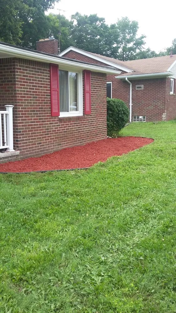 Custom outdoor landscaping for year-round maintenance in Garden City, MI by Total Lawn and Snow