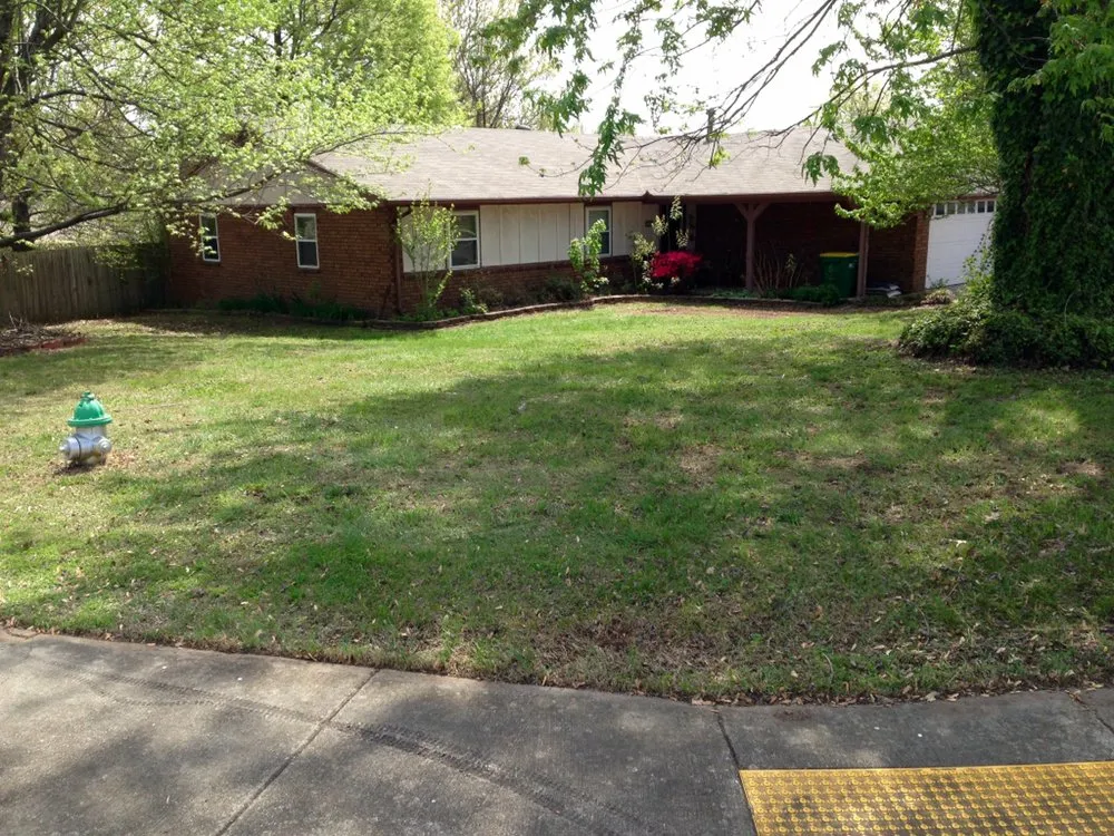 Professional lawn mowing service for beautiful yards across Fayetteville, AR - Total Lawn Care