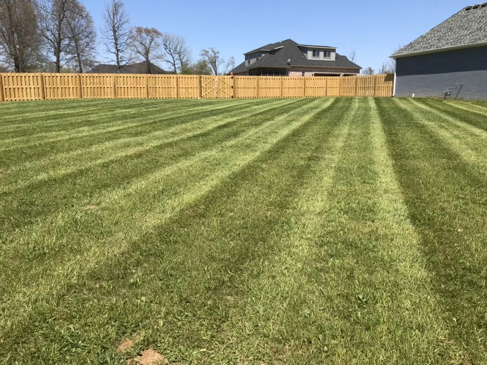 Custom landscape installation in Fayetteville, AR by Total Lawn Care