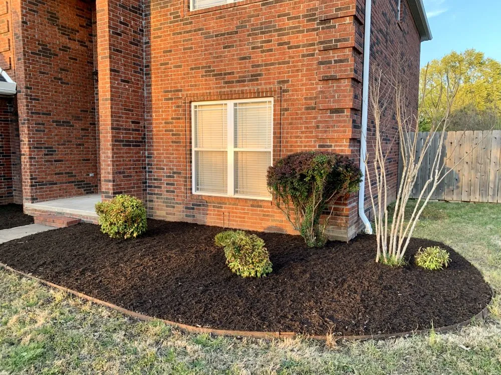 Professional yard cleanup service for outdoor upgrades in Fayetteville, AR by Total Lawn Care