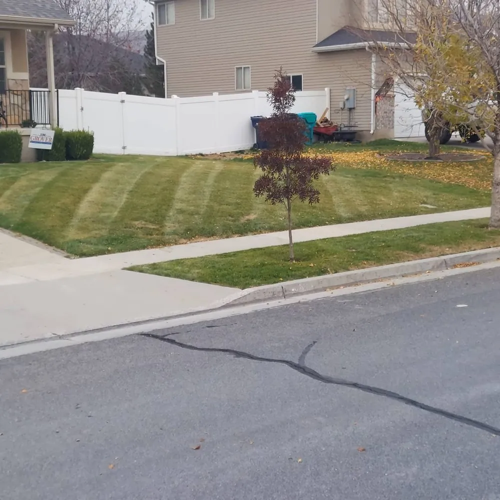 Custom landscape design for outdoor upgrades in Woods Cross, UT by Total Lawn Care