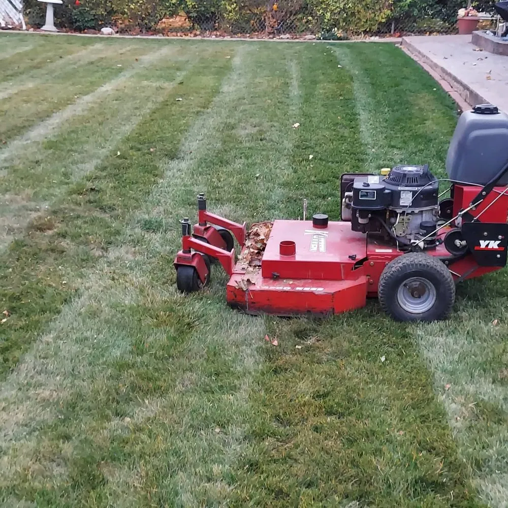 Expert lawn mowing service for residential properties in Woods Cross, UT by Total Lawn Care