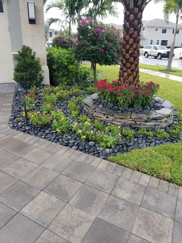 Reliable lawn mowing service for outdoor upgrades in Delray Beach, FL by Total Maintenance