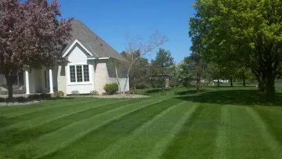 Local lawn mowing service for outdoor upgrades in Braham, MN by Total Renovation Landscaping