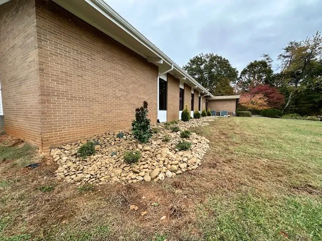 Expert lawn mowing service for homes in Corryton, TN by Total Terrain Management