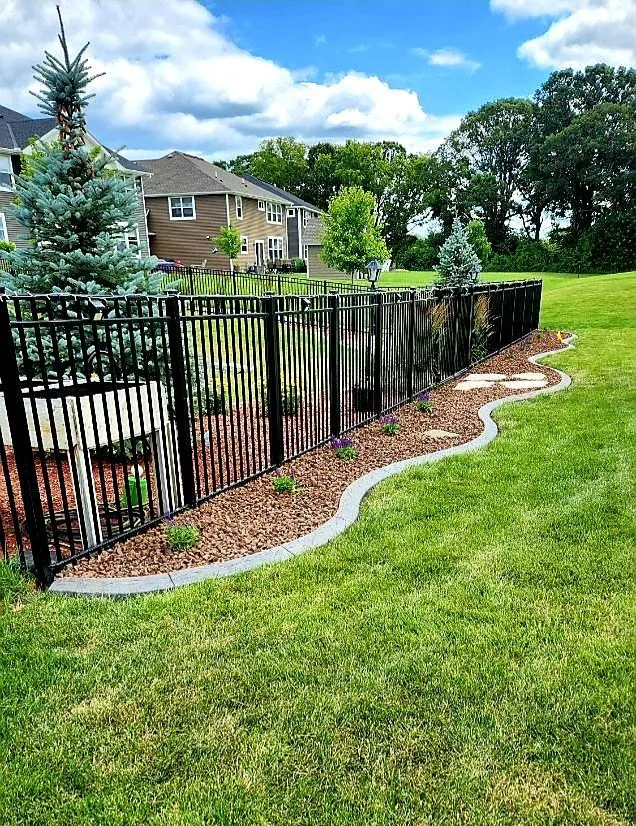 Custom landscaping services for homes across Lakeville, MN - Total Turf Maintenance