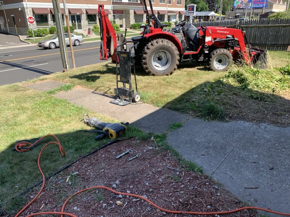 Affordable lawn care service for homes across Wallingford, CT - Totino Property Services