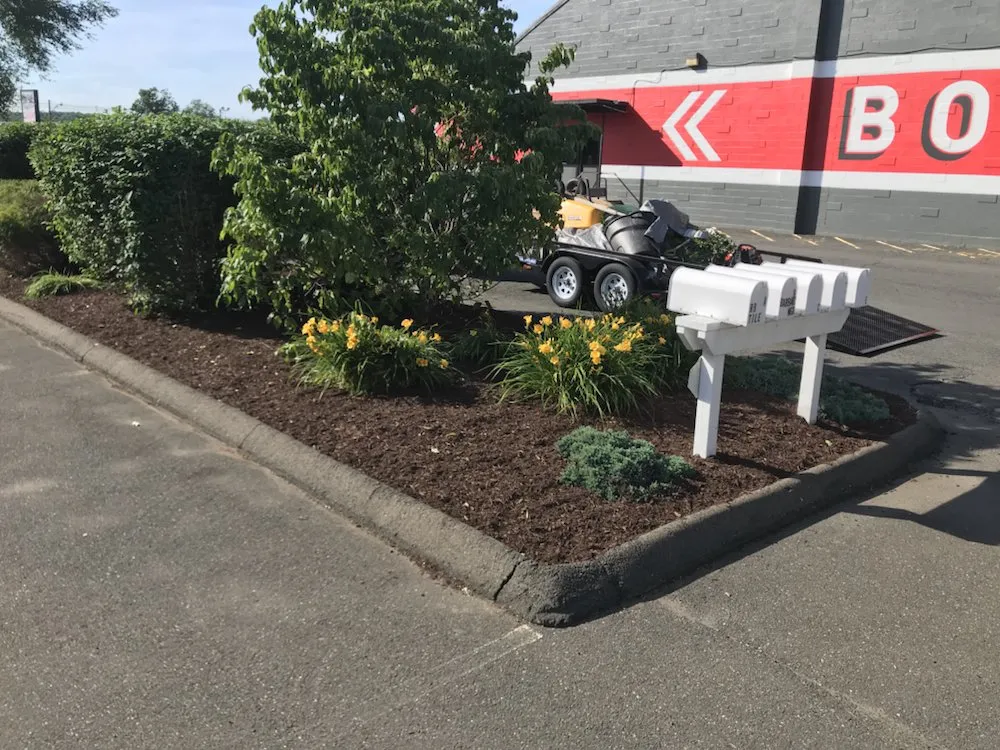 Reliable lawn mowing service with custom design in Wallingford, CT by Totino Property Services