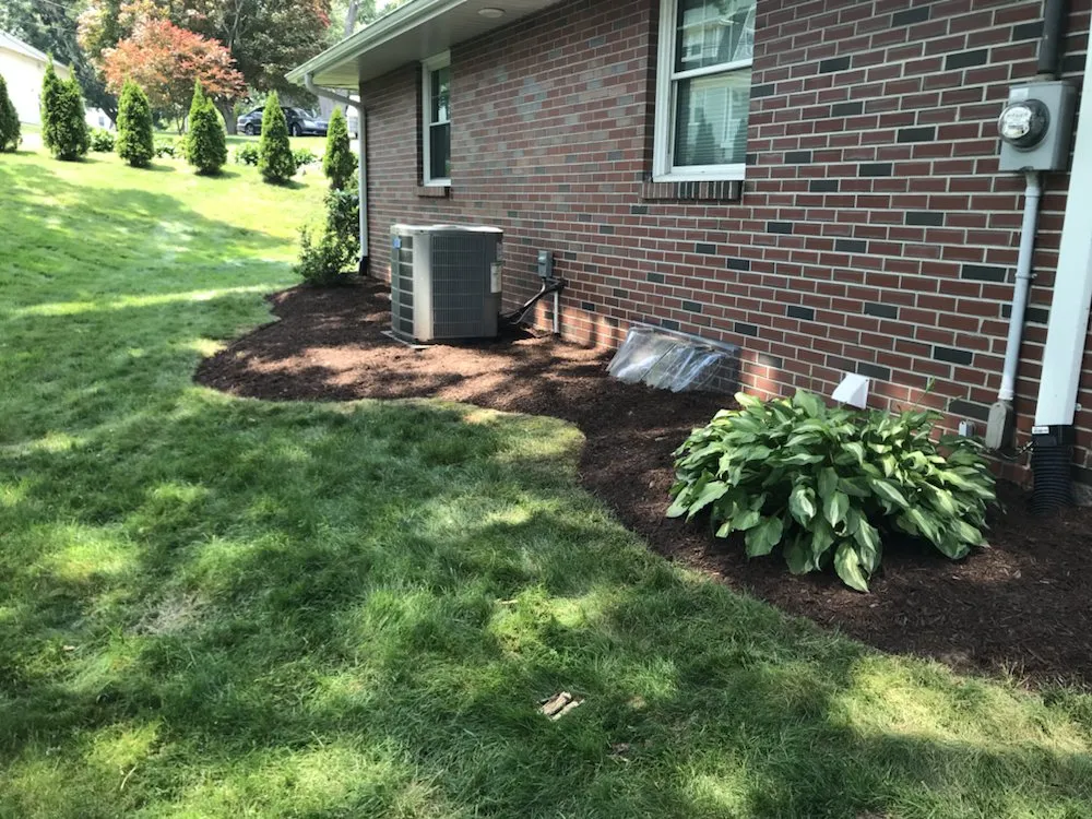 Expert lawn mowing service for residential properties in Wallingford, CT by Totino Property Services