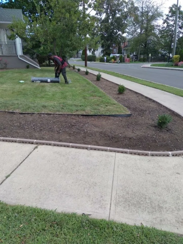 Trusted lawn mowing service in East Orange, NJ by Touch of Class Lawn Care