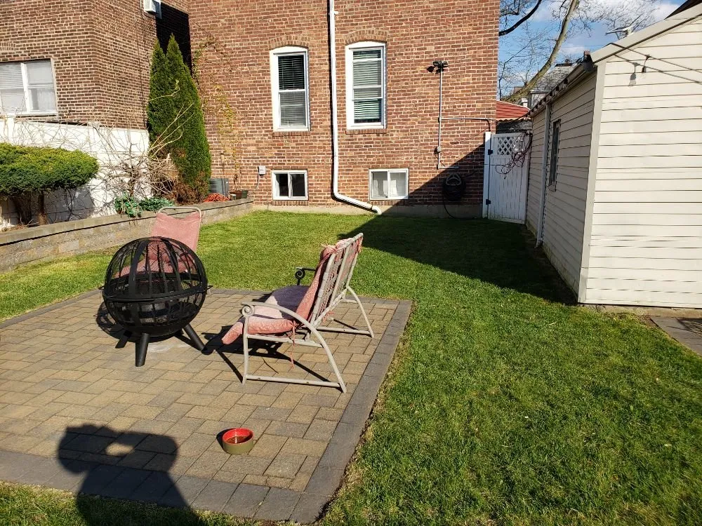Custom yard cleanup service for beautiful yards in East Orange, NJ by Touch of Class Lawn Care